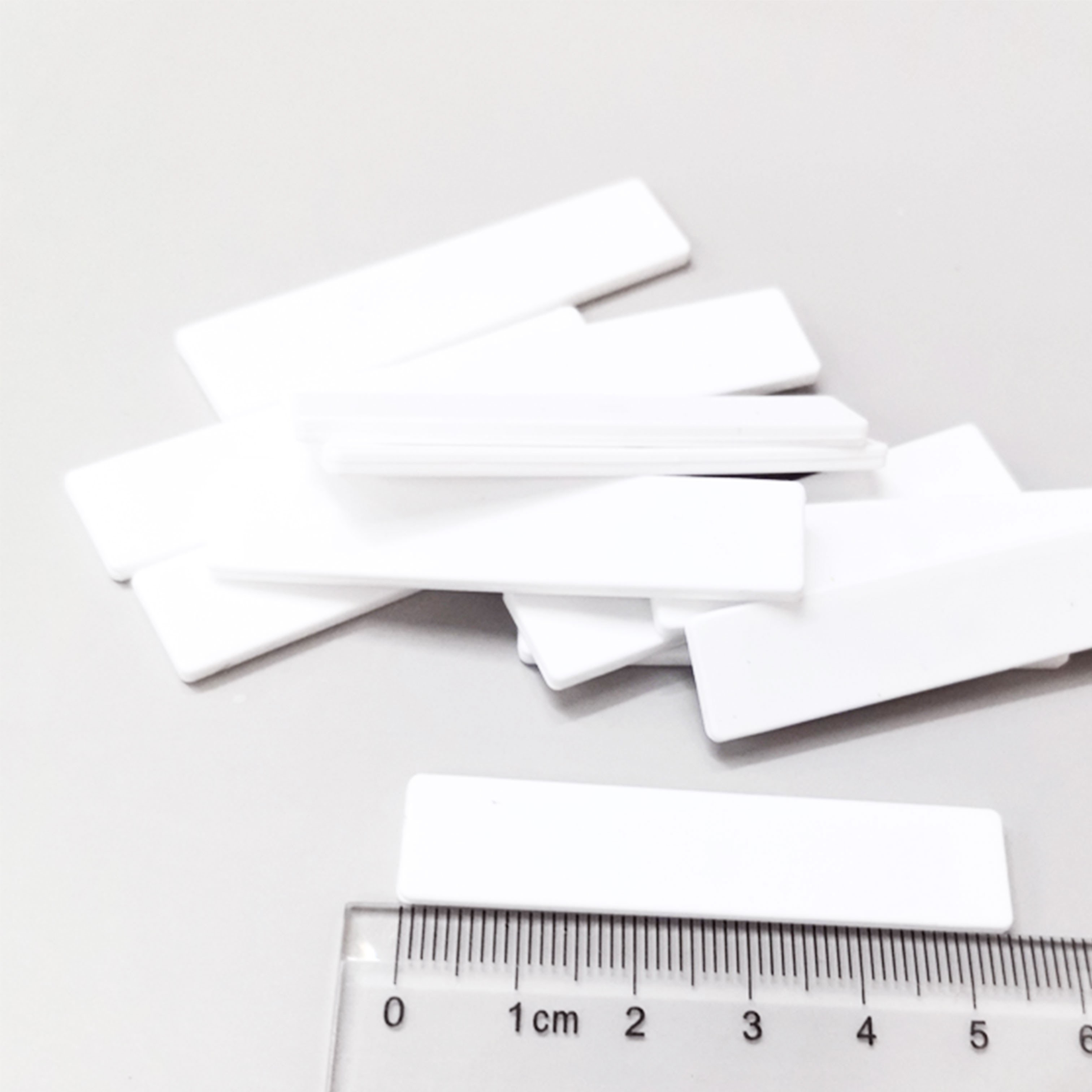 Etiqueta RFID de silicona para lavandería JT-F5512 de 860-960 MHz UHF